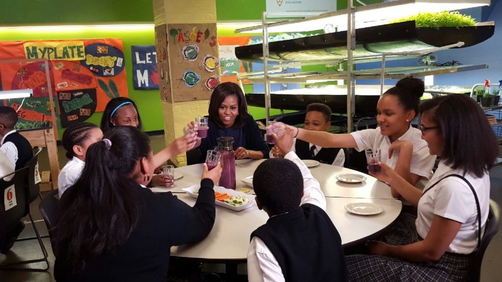 First Lady Michelle Obama took her garden tour to our home of Newark, where she visited our favorite youngest AeroFarmers – the students of Philips Academy Charter School. The school has a rooftop garden as well as an AeroFarms growing lab where they learn how their food is grown and gain a more tangible connection to the importance of fresh, healthy food.